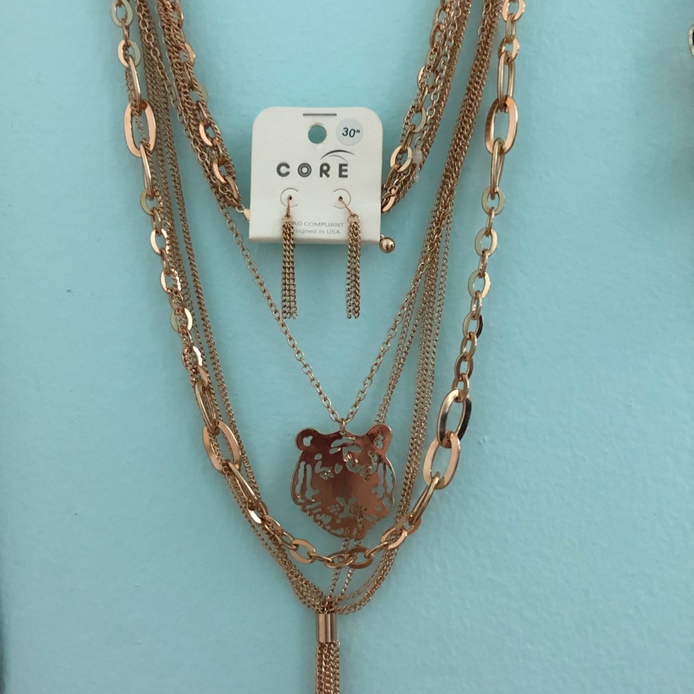 Gold multi chained tiger medallion necklace
